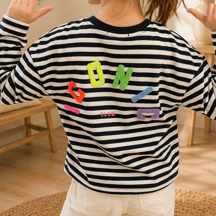 vêtement enfant tendance du 2 au 12 ans disponible à l'atelier n°1, boutique de prêt à porter et accessoires à saint Quentin 